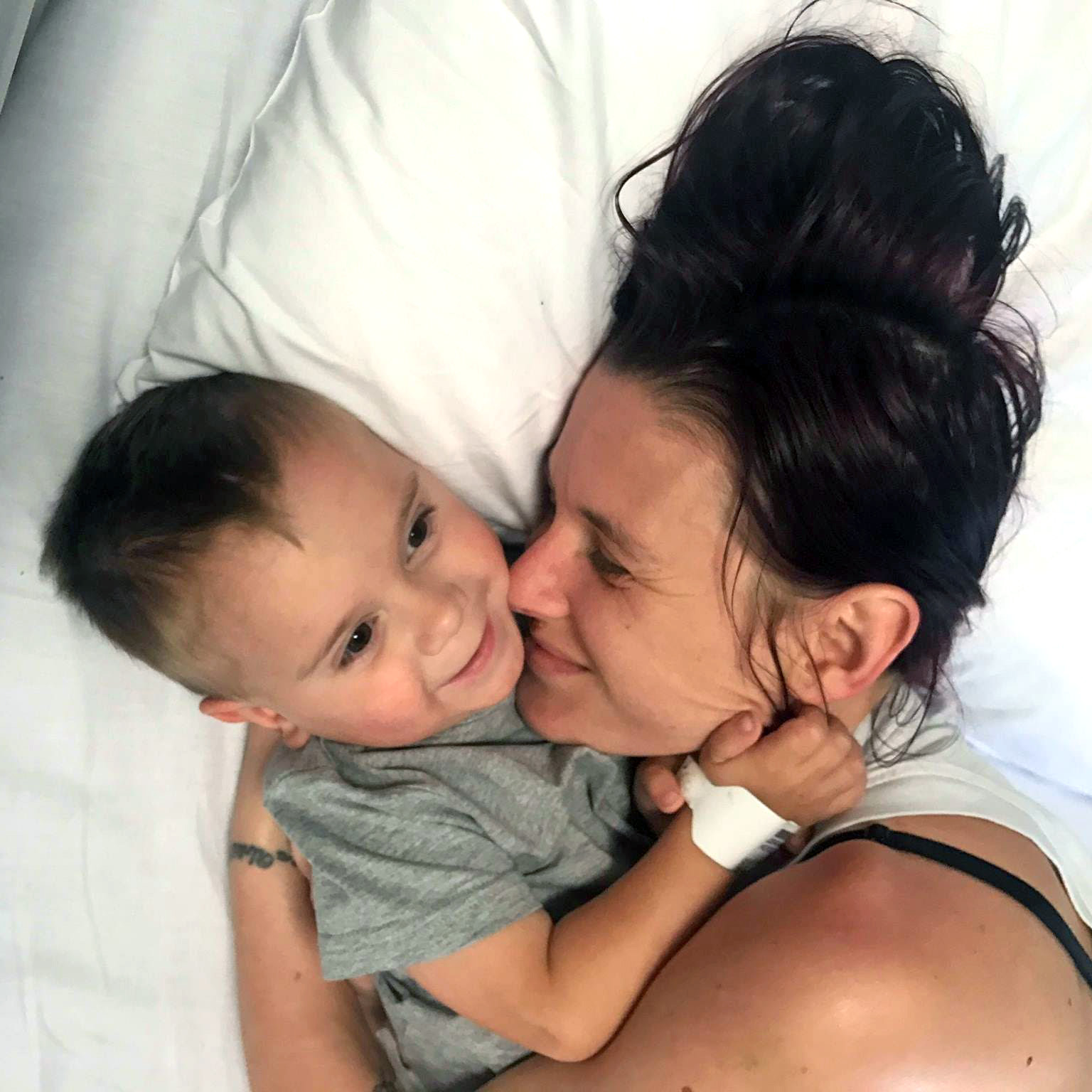 Brax cuddling his mum Brooke Sumner